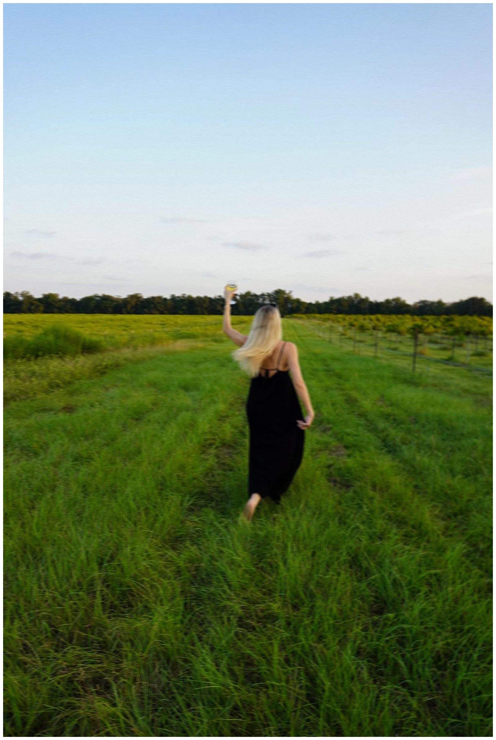 woman in vineyard in Door County in summer